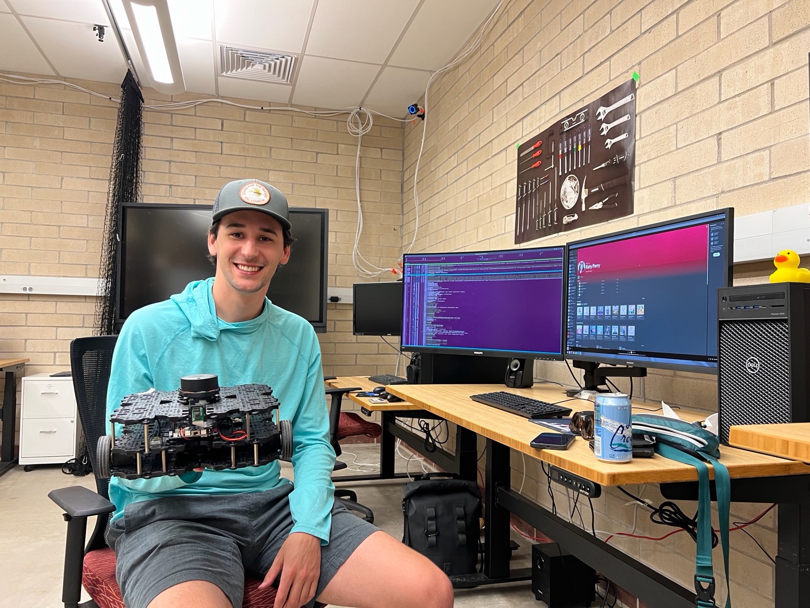 Ori holding a TurtleBot in the ARISE Lab